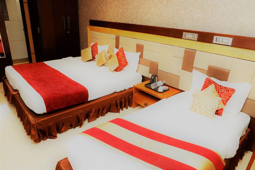 The Ashoka Hotel - Room