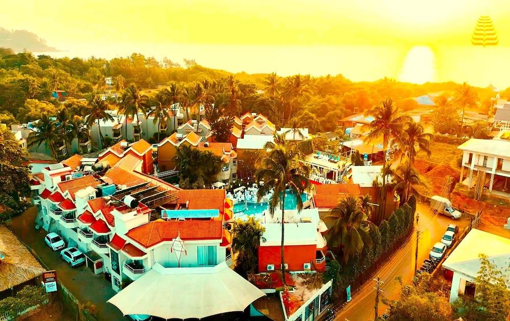 Whispering Palms Beach Resort - Featured Image