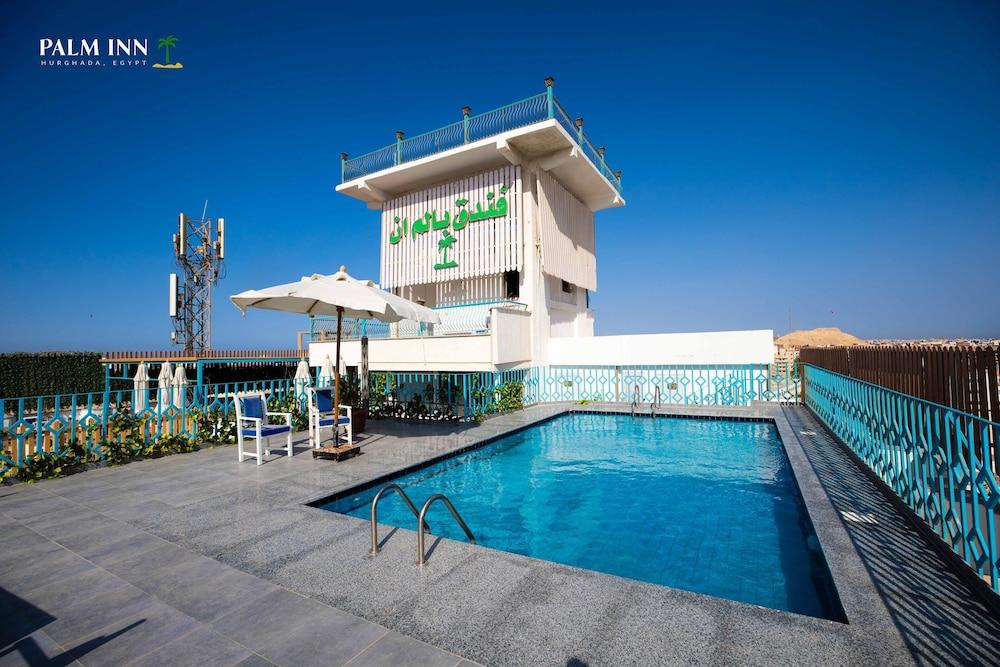 Palm Inn Hotel - Rooftop Pool