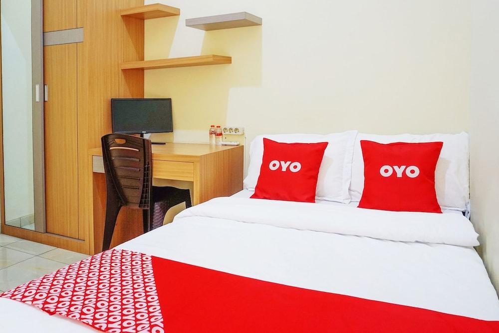 Super OYO Flagship 90723 Berlima Guest House Syariah - Featured Image