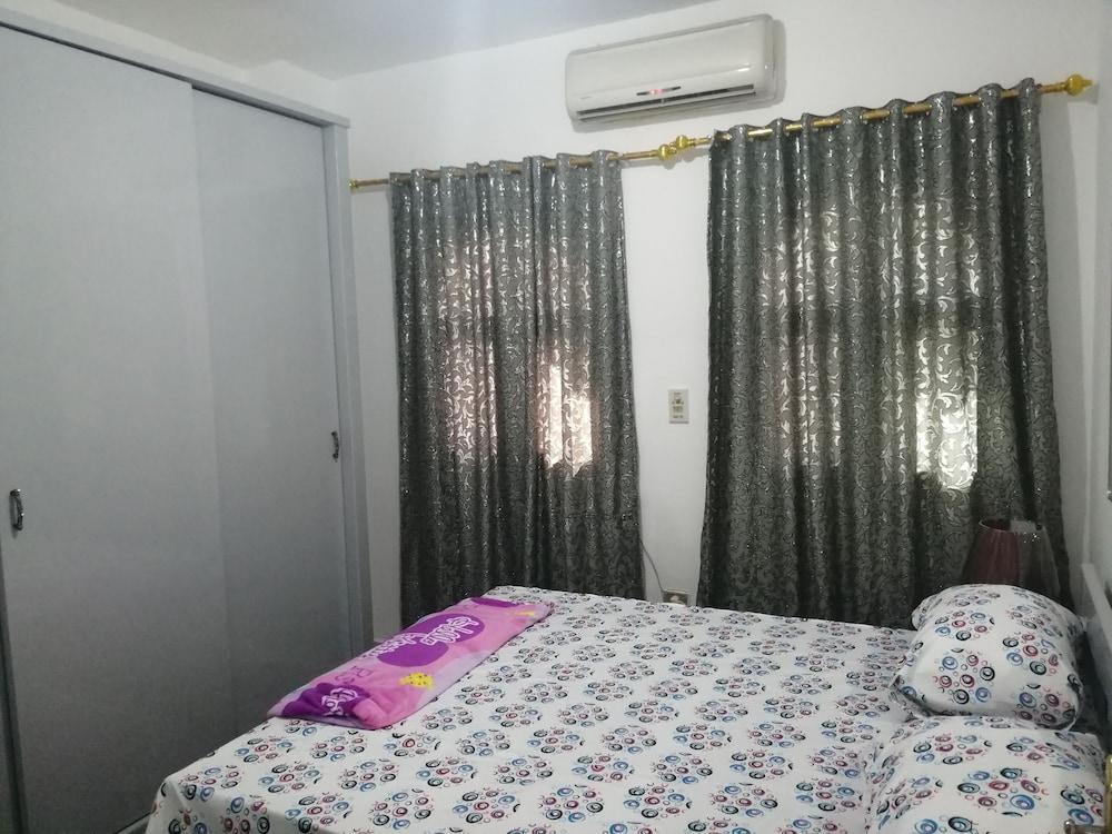 شقة مريحة من غرفتي نوم في منطقة الشيراتون - Featured Image