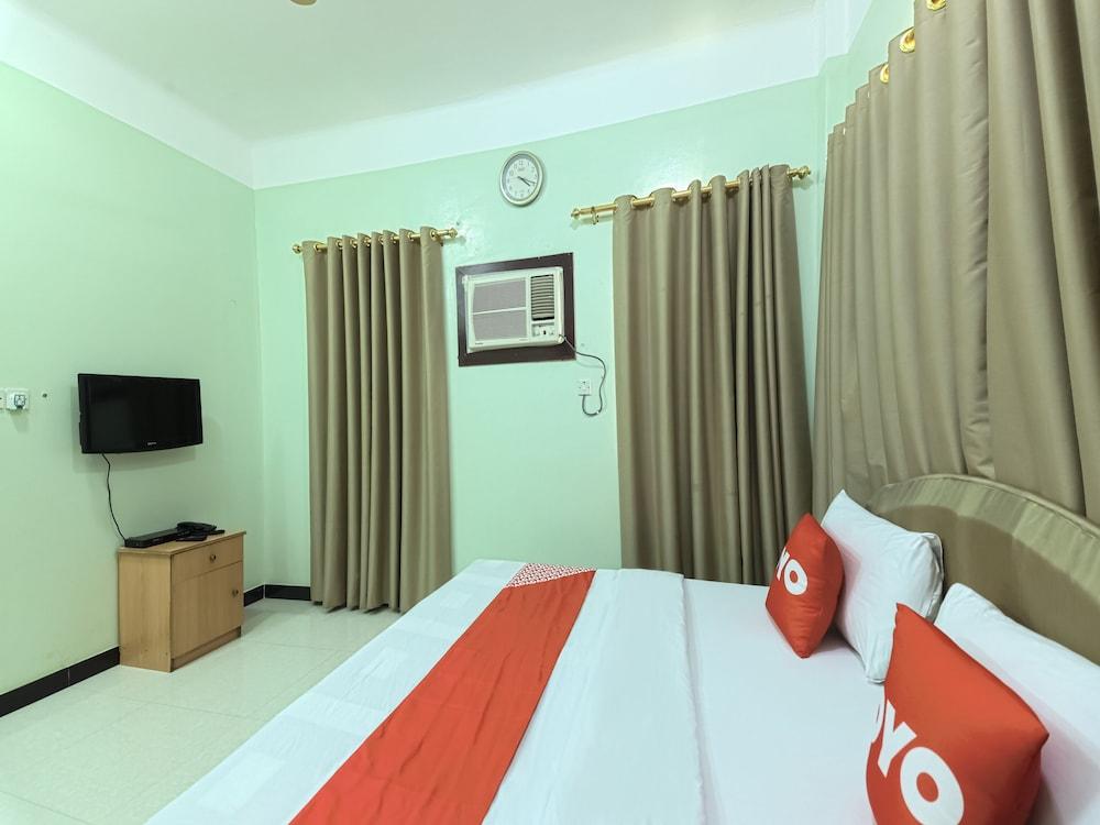 Super OYO 108 Marsa Al Masafar Hotel Apartment - Room