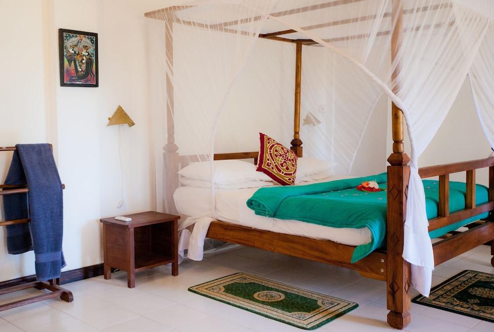 Flame Tree Cottages - Room
