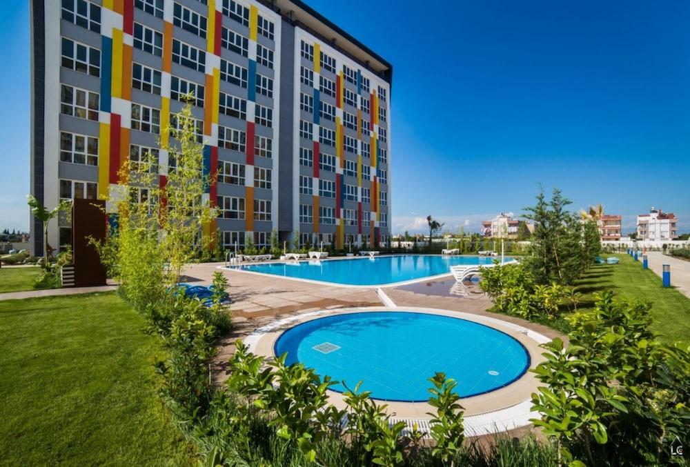 Central Flat With Shared Pool Near Antalya Airport - Featured Image
