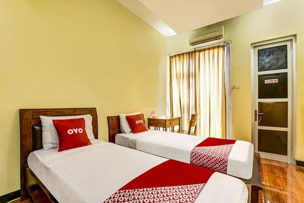 OYO 91036 Hotel Simpang Lima Gkpri - Room