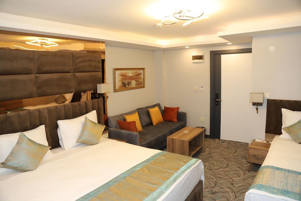 Grand Kavi Hotel - Room