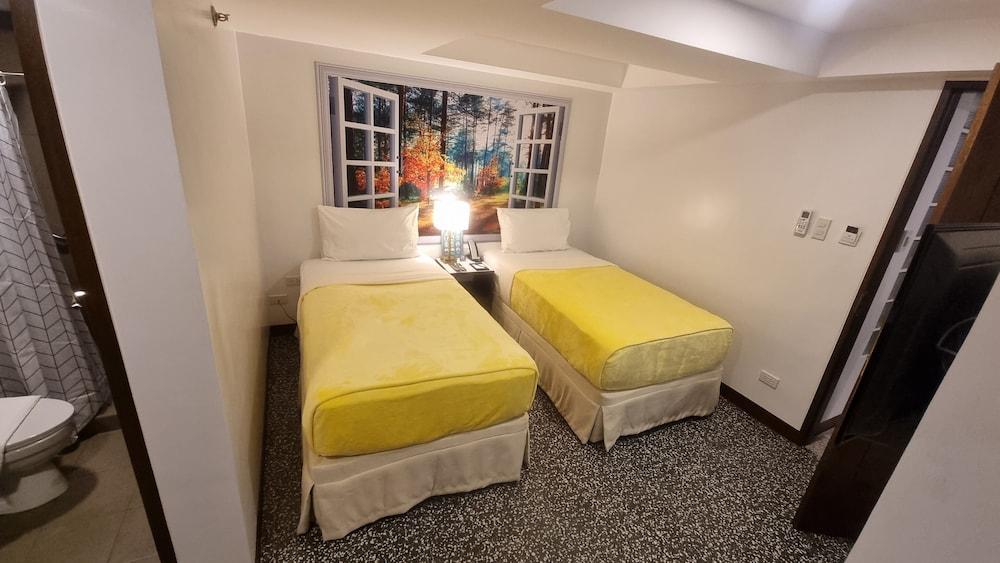 One Cristina Suites - Room