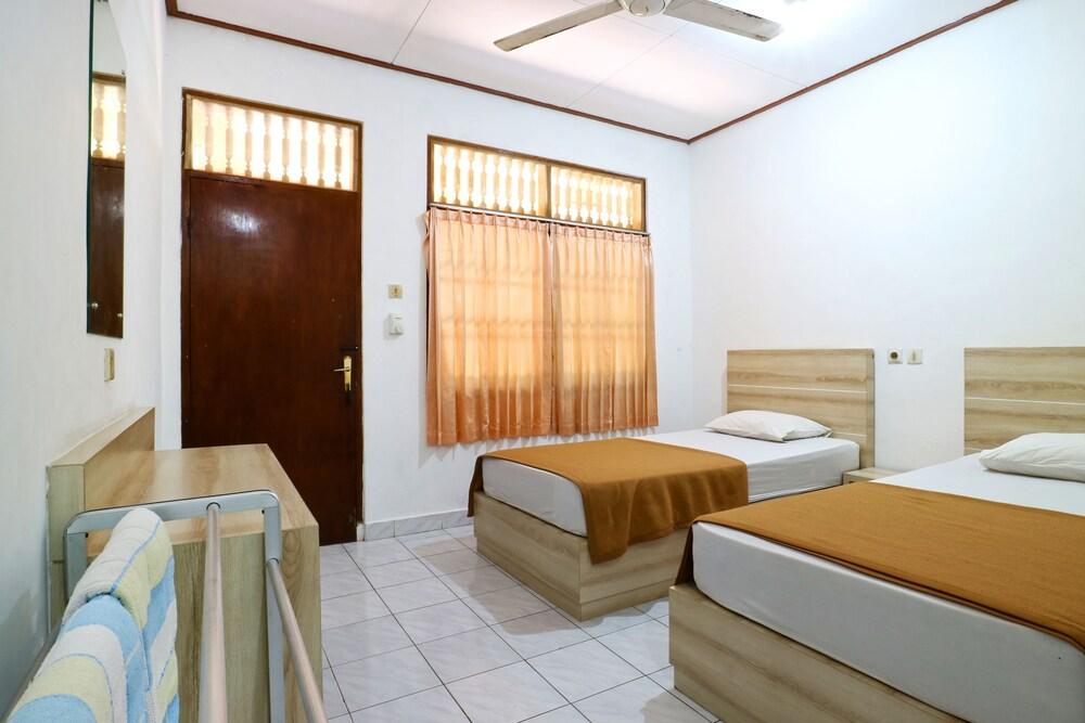 Palm Garden Kuta Hotel - Room